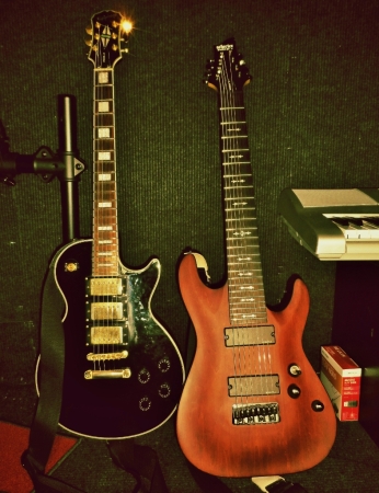 Andy's axes: Epiphone Black Beauty and Schecter Omen 8